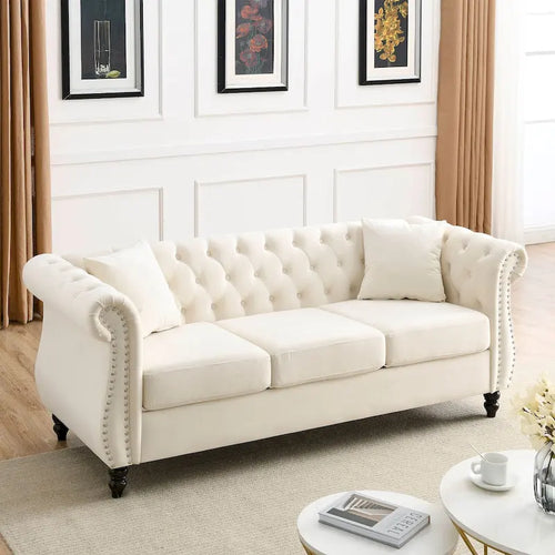 Canapé Chesterfield 3 places capitonné avec accoudoirs roulés et clous décoratifs