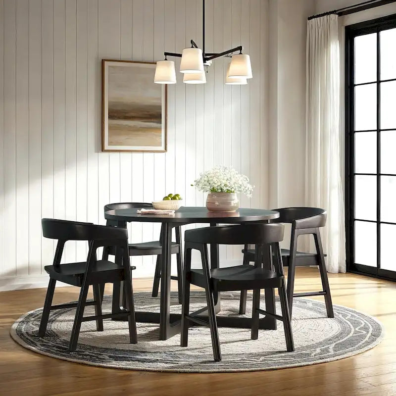 Table à manger moderne ronde en bois massif avec piètement géométrique