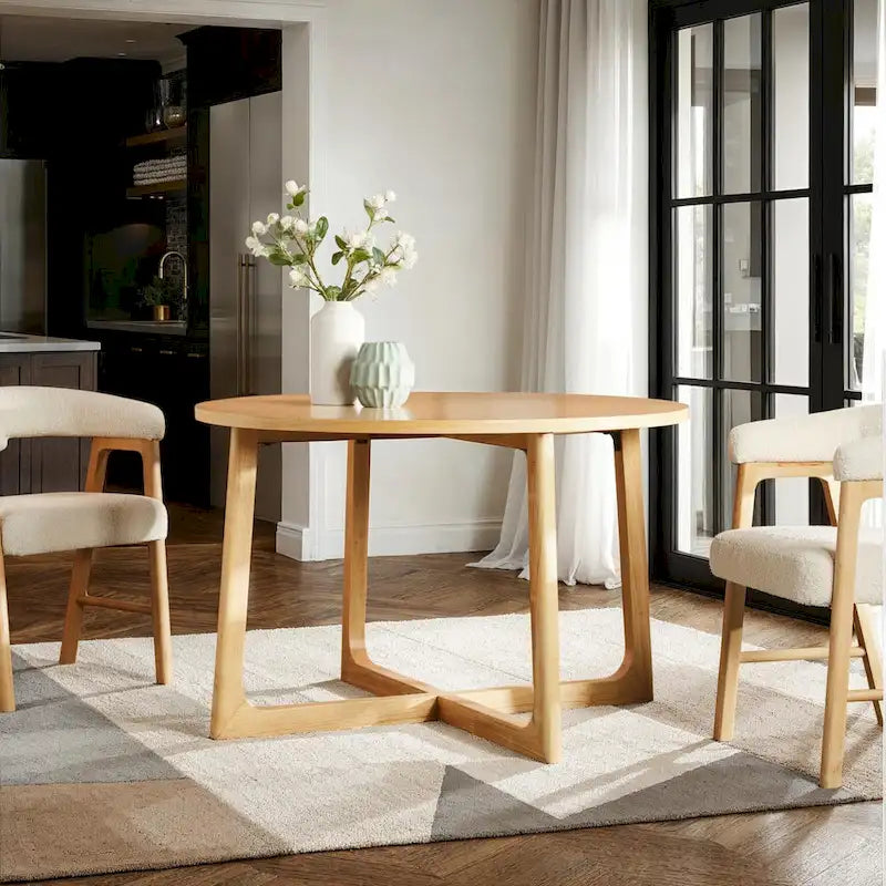 Table à manger moderne ronde en bois massif avec piètement géométrique
