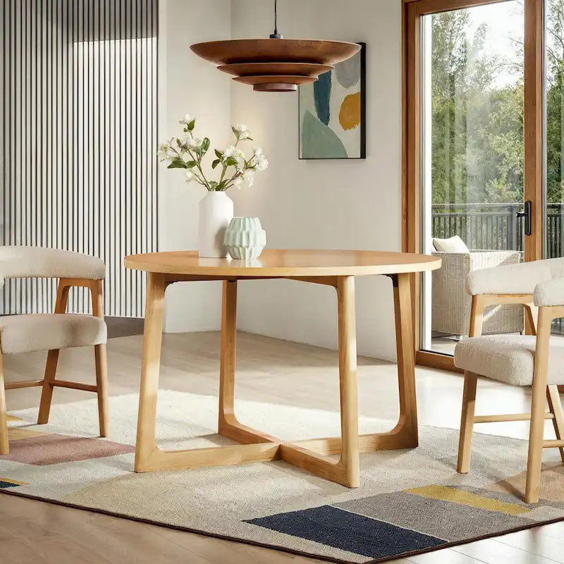 Table à manger moderne ronde en bois massif avec piètement géométrique