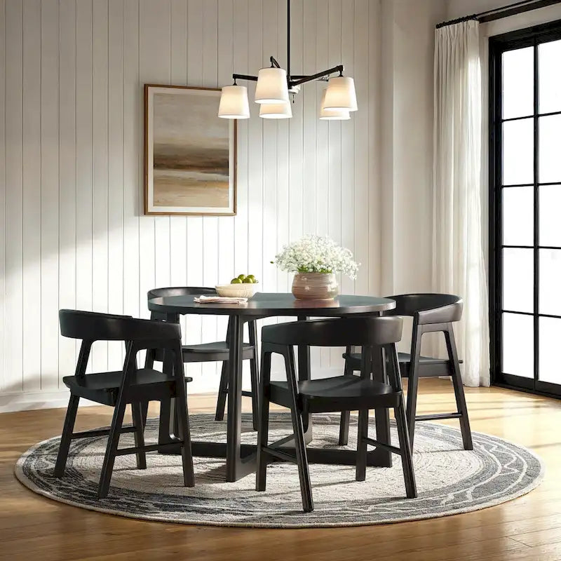 Table à manger moderne ronde en bois massif avec piètement géométrique